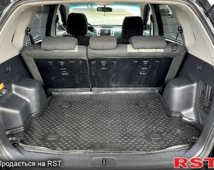 Черный Хендай Туксон, объемом двигателя 2 л и пробегом 190 тыс. км за 7800 $, фото 3 на Automoto.ua