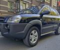 Черный Хендай Туксон, объемом двигателя 2 л и пробегом 226 тыс. км за 8299 $, фото 1 на Automoto.ua