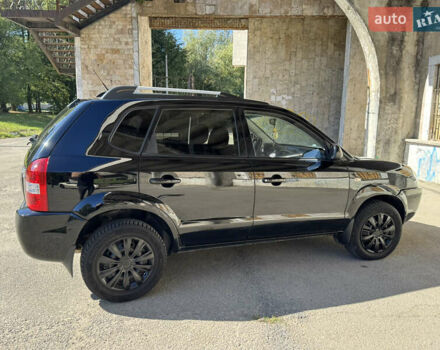 Черный Хендай Туксон, объемом двигателя 2 л и пробегом 189 тыс. км за 8250 $, фото 15 на Automoto.ua