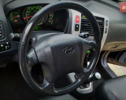 Чорний Хендай Туксон, об'ємом двигуна 2 л та пробігом 229 тис. км за 8600 $, фото 121 на Automoto.ua