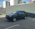 Чорний Хендай Туксон, об'ємом двигуна 1.98 л та пробігом 203 тис. км за 8500 $, фото 1 на Automoto.ua