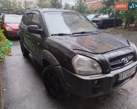 Чорний Хендай Туксон, об'ємом двигуна 1.98 л та пробігом 234 тис. км за 8000 $, фото 3 на Automoto.ua