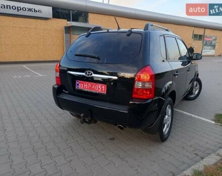 Чорний Хендай Туксон, об'ємом двигуна 1.98 л та пробігом 192 тис. км за 7950 $, фото 10 на Automoto.ua