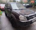 Черный Хендай Туксон, объемом двигателя 1.98 л и пробегом 234 тыс. км за 7800 $, фото 3 на Automoto.ua