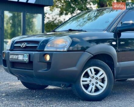Черный Хендай Туксон, объемом двигателя 2 л и пробегом 227 тыс. км за 8200 $, фото 10 на Automoto.ua