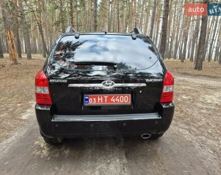 Черный Хендай Туксон, объемом двигателя 2 л и пробегом 198 тыс. км за 7800 $, фото 5 на Automoto.ua