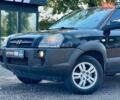 Черный Хендай Туксон, объемом двигателя 2 л и пробегом 227 тыс. км за 8200 $, фото 10 на Automoto.ua