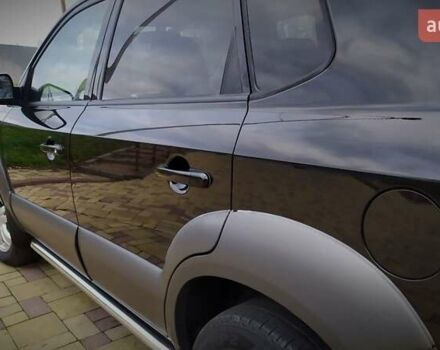 Чорний Хендай Туксон, об'ємом двигуна 2 л та пробігом 229 тис. км за 8600 $, фото 84 на Automoto.ua