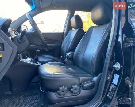 Черный Хендай Туксон, объемом двигателя 1.98 л и пробегом 286 тыс. км за 7300 $, фото 20 на Automoto.ua