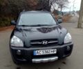 Черный Хендай Туксон, объемом двигателя 2 л и пробегом 196 тыс. км за 8950 $, фото 1 на Automoto.ua