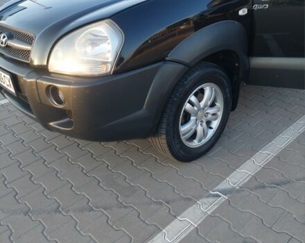 Черный Хендай Туксон, объемом двигателя 2 л и пробегом 289 тыс. км за 6600 $, фото 2 на Automoto.ua