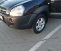 Черный Хендай Туксон, объемом двигателя 2 л и пробегом 289 тыс. км за 6600 $, фото 2 на Automoto.ua