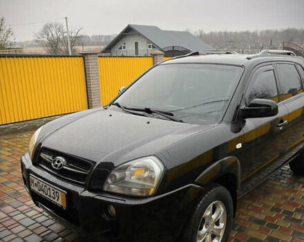 Черный Хендай Туксон, объемом двигателя 2 л и пробегом 151 тыс. км за 9100 $, фото 8 на Automoto.ua