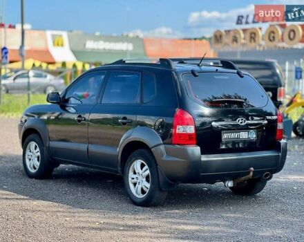 Черный Хендай Туксон, объемом двигателя 2 л и пробегом 227 тыс. км за 8200 $, фото 3 на Automoto.ua