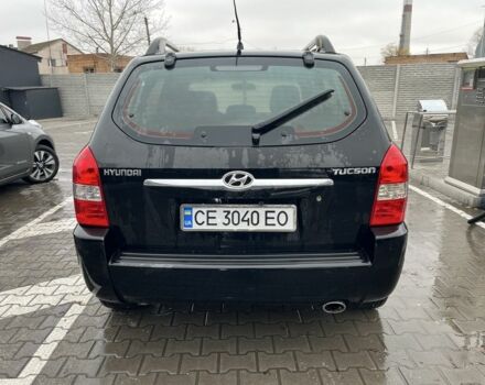 Черный Хендай Туксон, объемом двигателя 2 л и пробегом 177 тыс. км за 8500 $, фото 2 на Automoto.ua