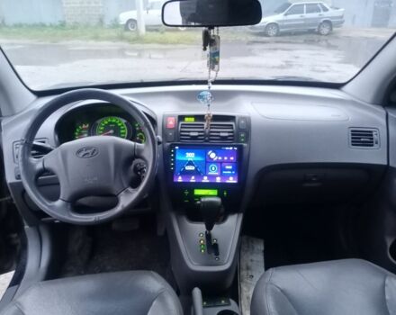 Черный Хендай Туксон, объемом двигателя 2 л и пробегом 280 тыс. км за 3500 $, фото 6 на Automoto.ua