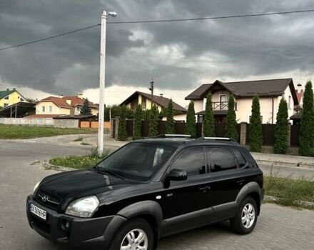 Черный Хендай Туксон, объемом двигателя 2.7 л и пробегом 266 тыс. км за 7700 $, фото 2 на Automoto.ua