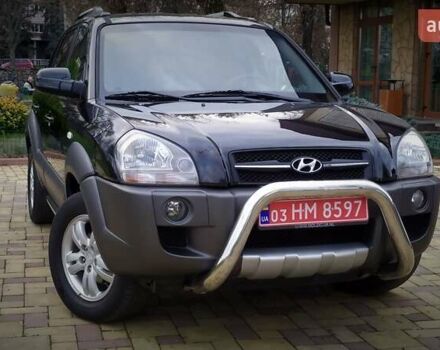 Чорний Хендай Туксон, об'ємом двигуна 2 л та пробігом 229 тис. км за 8600 $, фото 7 на Automoto.ua