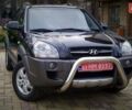 Чорний Хендай Туксон, об'ємом двигуна 2 л та пробігом 229 тис. км за 8600 $, фото 7 на Automoto.ua