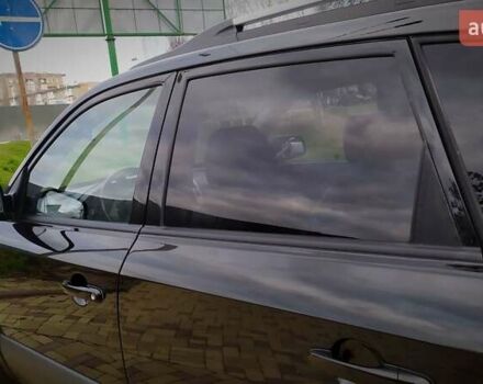 Чорний Хендай Туксон, об'ємом двигуна 2 л та пробігом 229 тис. км за 8600 $, фото 90 на Automoto.ua