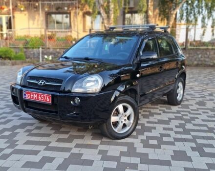 Чорний Хендай Туксон, об'ємом двигуна 2 л та пробігом 190 тис. км за 8300 $, фото 1 на Automoto.ua