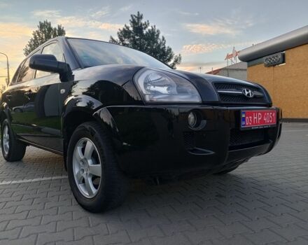 Черный Хендай Туксон, объемом двигателя 2 л и пробегом 192 тыс. км за 7950 $, фото 7 на Automoto.ua
