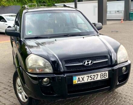 Черный Хендай Туксон, объемом двигателя 2 л и пробегом 175 тыс. км за 8900 $, фото 7 на Automoto.ua