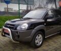 Чорний Хендай Туксон, об'ємом двигуна 2 л та пробігом 229 тис. км за 8600 $, фото 13 на Automoto.ua