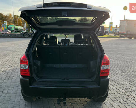 Черный Хендай Туксон, объемом двигателя 1.98 л и пробегом 243 тыс. км за 8500 $, фото 18 на Automoto.ua