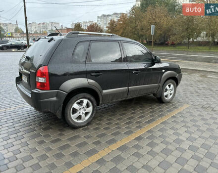 Черный Хендай Туксон, объемом двигателя 2 л и пробегом 176 тыс. км за 7450 $, фото 6 на Automoto.ua