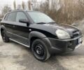 Черный Хендай Туксон, объемом двигателя 2 л и пробегом 330 тыс. км за 4350 $, фото 9 на Automoto.ua