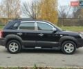 Черный Хендай Туксон, объемом двигателя 2 л и пробегом 270 тыс. км за 6800 $, фото 5 на Automoto.ua