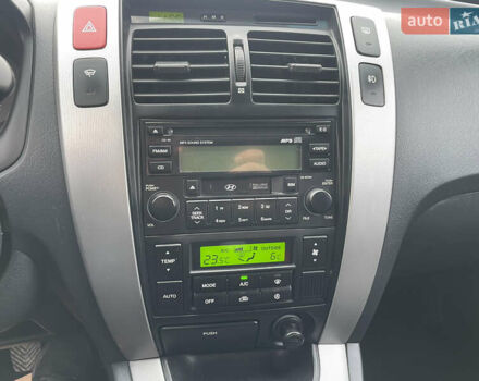 Черный Хендай Туксон, объемом двигателя 2 л и пробегом 180 тыс. км за 7700 $, фото 35 на Automoto.ua