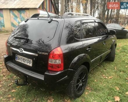 Черный Хендай Туксон, объемом двигателя 2 л и пробегом 210 тыс. км за 8999 $, фото 22 на Automoto.ua
