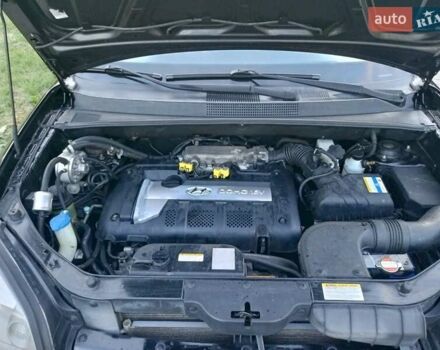 Чорний Хендай Туксон, об'ємом двигуна 1.98 л та пробігом 192 тис. км за 7950 $, фото 46 на Automoto.ua