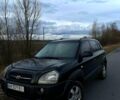 Черный Хендай Туксон, объемом двигателя 20 л и пробегом 300 тыс. км за 7500 $, фото 1 на Automoto.ua