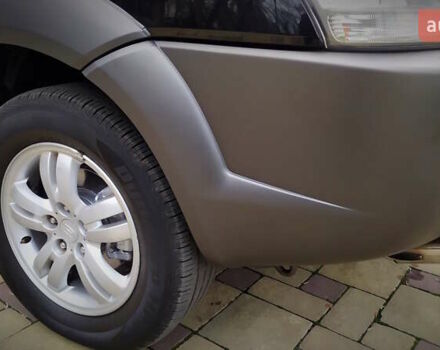 Чорний Хендай Туксон, об'ємом двигуна 2 л та пробігом 229 тис. км за 8600 $, фото 64 на Automoto.ua