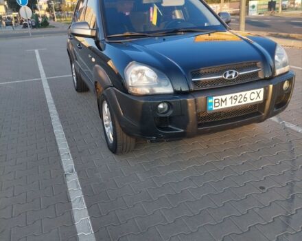 Черный Хендай Туксон, объемом двигателя 2 л и пробегом 289 тыс. км за 6600 $, фото 4 на Automoto.ua