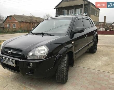 Черный Хендай Туксон, объемом двигателя 2 л и пробегом 210 тыс. км за 8999 $, фото 34 на Automoto.ua