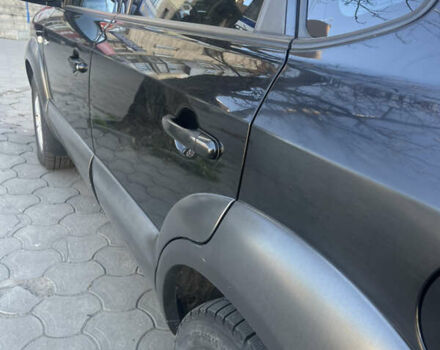 Чорний Хендай Туксон, об'ємом двигуна 1.98 л та пробігом 300 тис. км за 6800 $, фото 4 на Automoto.ua