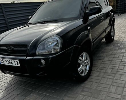 Чорний Хендай Туксон, об'ємом двигуна 2 л та пробігом 253 тис. км за 9428 $, фото 1 на Automoto.ua