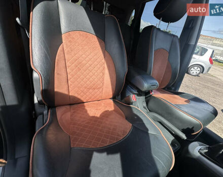Черный Хендай Туксон, объемом двигателя 2 л и пробегом 198 тыс. км за 8600 $, фото 33 на Automoto.ua