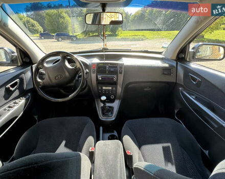 Черный Хендай Туксон, объемом двигателя 2 л и пробегом 189 тыс. км за 8250 $, фото 31 на Automoto.ua