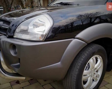 Чорний Хендай Туксон, об'ємом двигуна 2 л та пробігом 229 тис. км за 8600 $, фото 57 на Automoto.ua