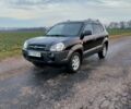 Черный Хендай Туксон, объемом двигателя 2 л и пробегом 272 тыс. км за 7500 $, фото 1 на Automoto.ua