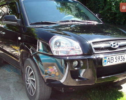 Черный Хендай Туксон, объемом двигателя 1.98 л и пробегом 234 тыс. км за 7800 $, фото 7 на Automoto.ua