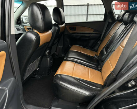 Чорний Хендай Туксон, об'ємом двигуна 2 л та пробігом 230 тис. км за 6850 $, фото 14 на Automoto.ua
