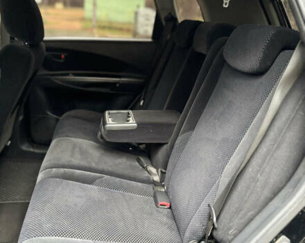 Черный Хендай Туксон, объемом двигателя 1.99 л и пробегом 266 тыс. км за 7500 $, фото 8 на Automoto.ua