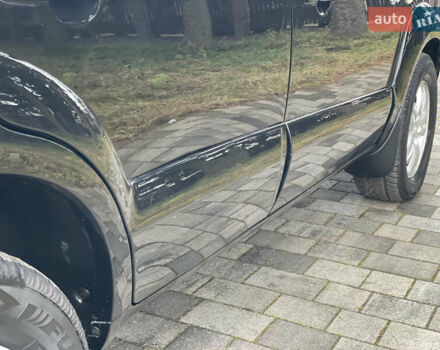 Черный Хендай Туксон, объемом двигателя 2 л и пробегом 180 тыс. км за 7700 $, фото 13 на Automoto.ua