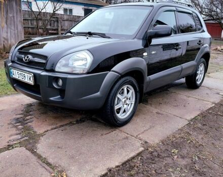 Черный Хендай Туксон, объемом двигателя 2 л и пробегом 272 тыс. км за 7500 $, фото 1 на Automoto.ua